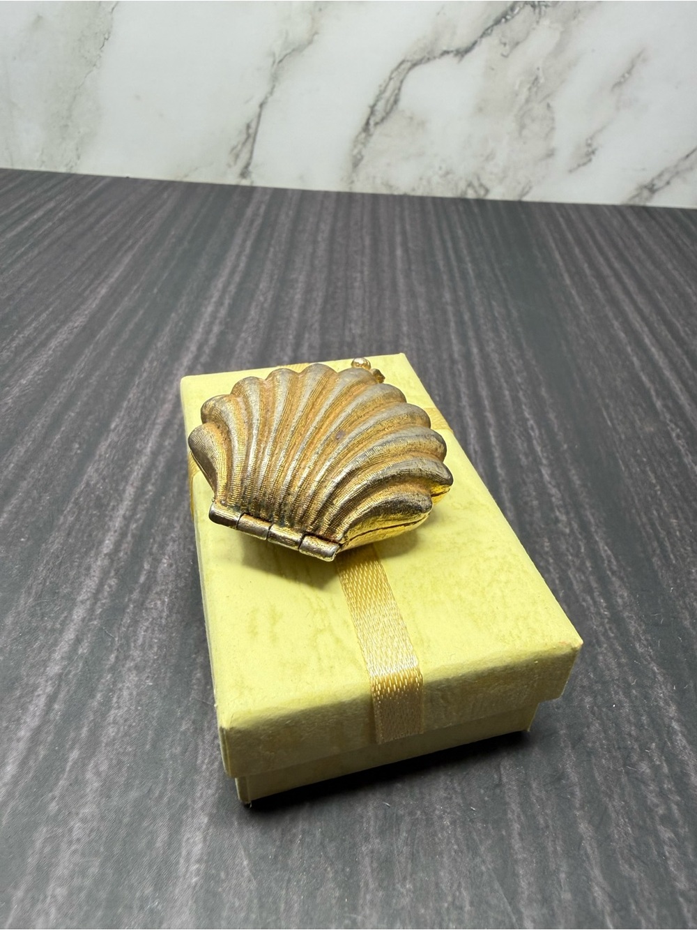 VINTAGE GIVENCHY GOLD TONE CLAM SHELL SOLID PERFUME COMPACT